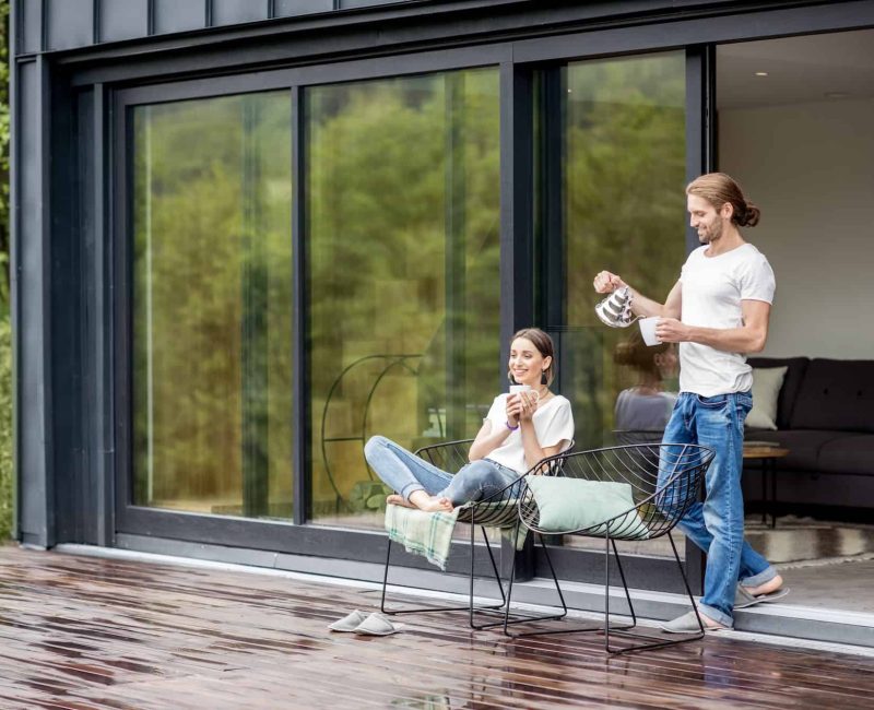couple-on-the-terrace-of-the-modern-house.jpg